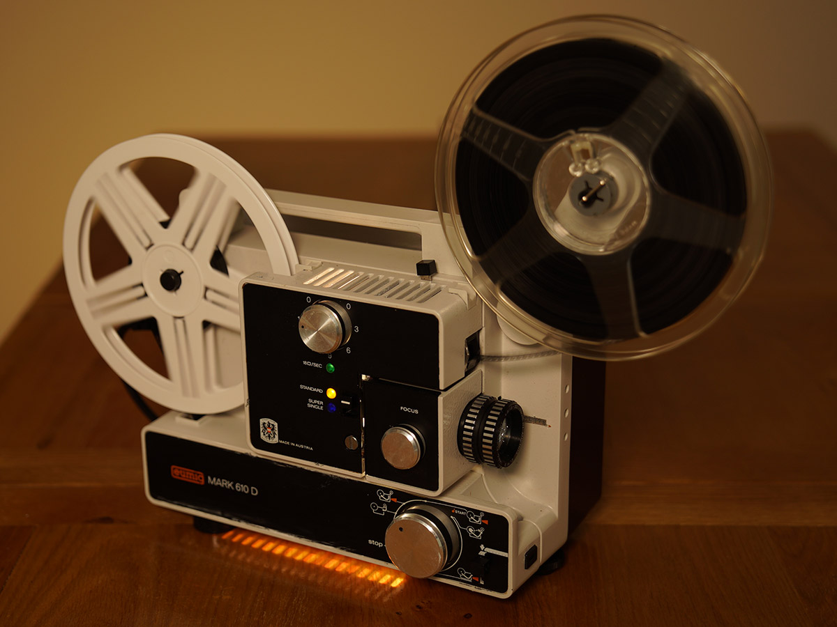 Eumig Mark 610D cine projector with film reels